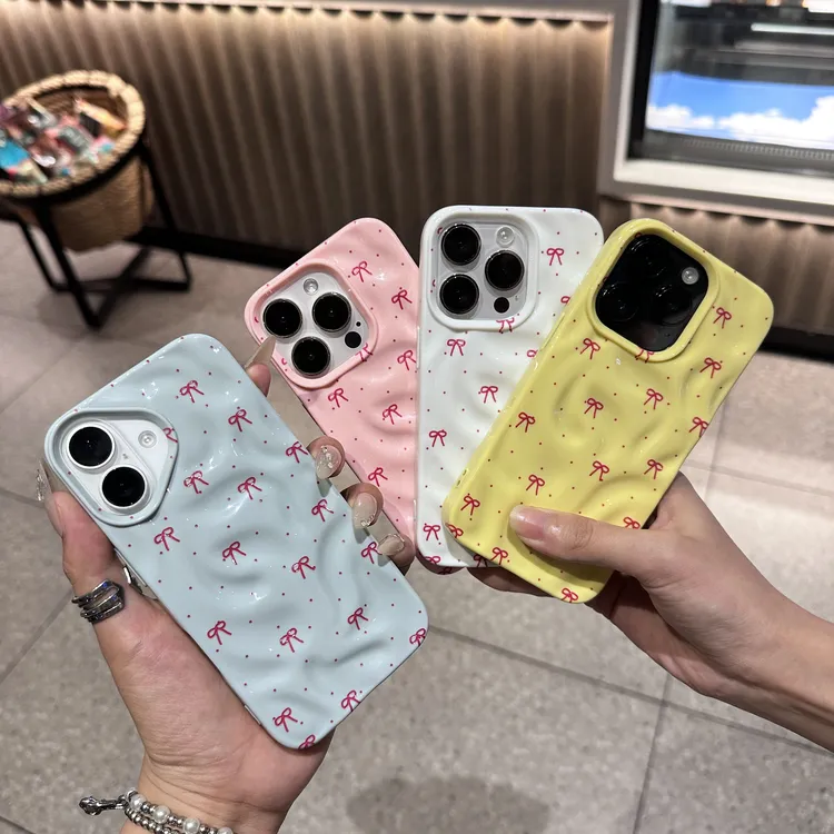 可爱满屏蝴蝶结牛奶壳适用iPhone16苹果14promax手机壳15防摔13