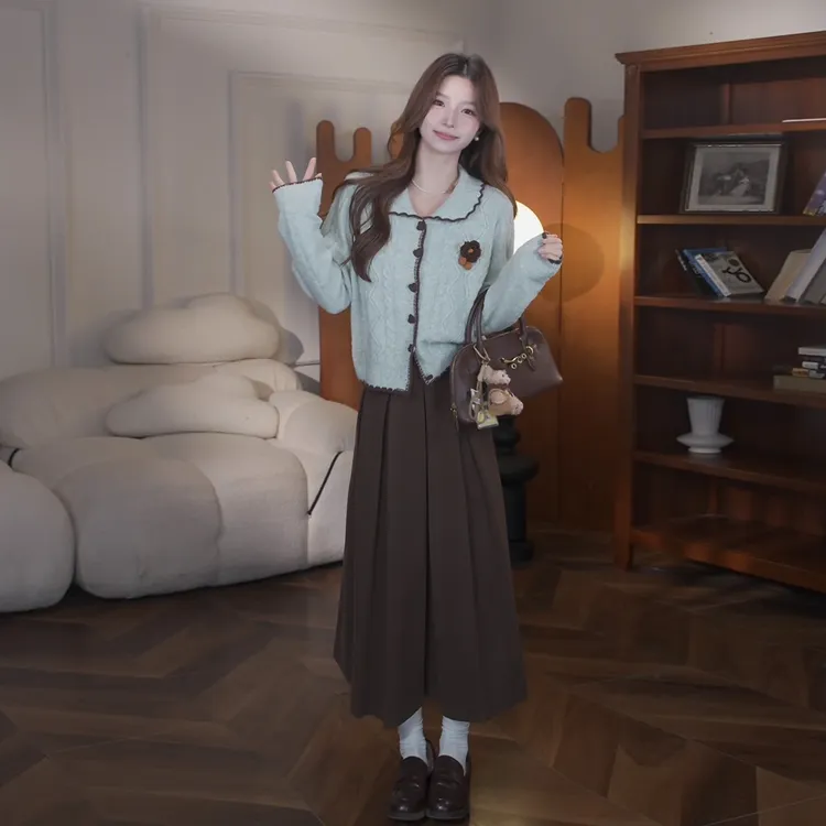绿色毛衣外套半身连衣裙子女2025新款韩系早秋穿搭配一整套装长裙