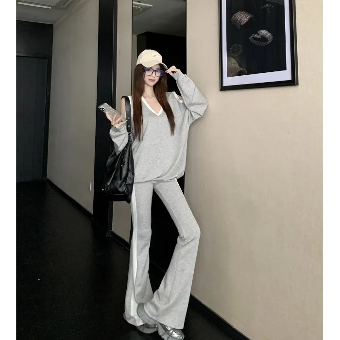 时尚套装露肩气质撞色拼接长袖卫衣女秋季高腰显瘦微喇长裤两件套