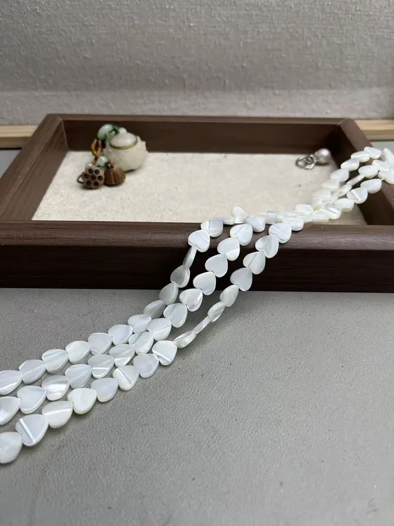 天然10mm左右海水白蝶贝爱心散珠半成品长度39cm左右可DIY当配珠