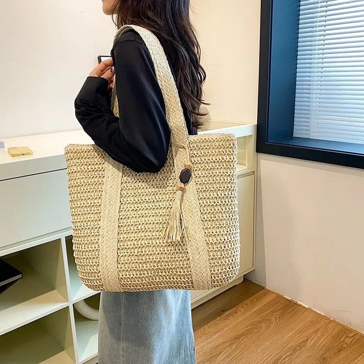 夏日慵懒风草编包女2025新款百搭大容量通勤托特包时尚洋气编织包