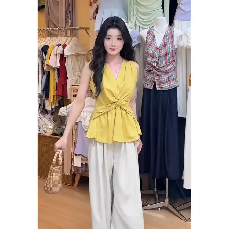 黄色V领扭结通勤吊带背心女夏外穿多巴胺穿搭设计感小众无袖上衣