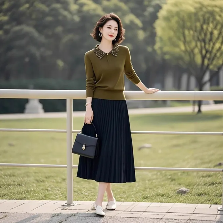 今年流行的针织套装女装2025秋季新款polo领上衣百褶半身裙两件套