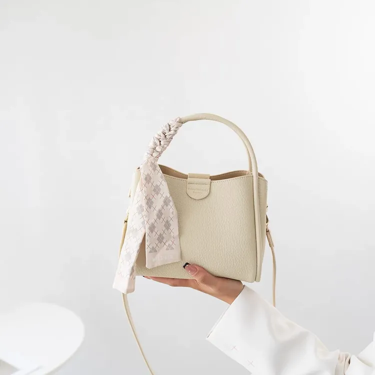 【女神包柜】简约时尚百搭荔枝纹水桶包