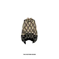 The pattern room | 织物之美秩序黑白暖菱格高领毛衣