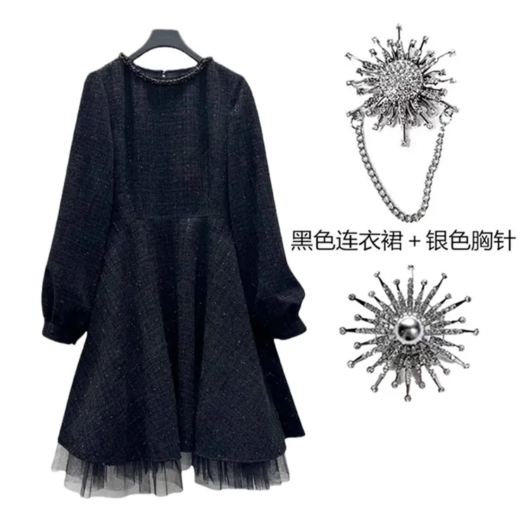 2026年春季法式新款时尚胸针百搭慵懒风显瘦休闲中长款黑色连衣裙