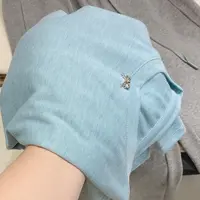 宝衣家 秋季云水蓝蝴蝶结扣水溶天丝羊毛长袖