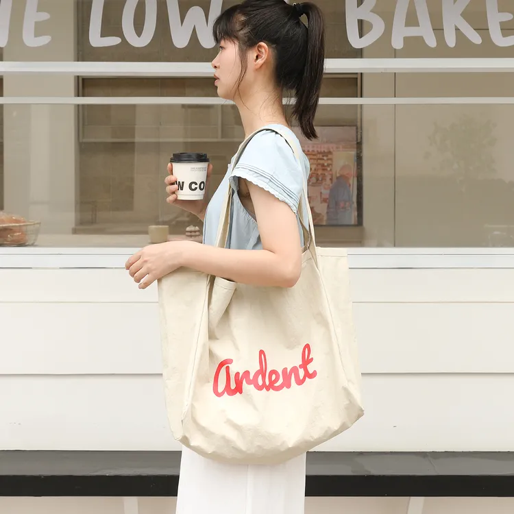 韩版字母尼龙布托特包女百搭大容量单肩腋下包慵懒风学生上课布袋
