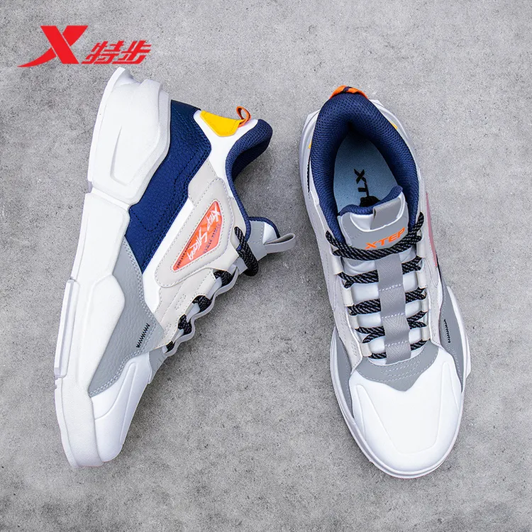 XTEP/特步男鞋新款百搭防滑潮流撞色休闲减震鞋皮面时尚中帮板鞋