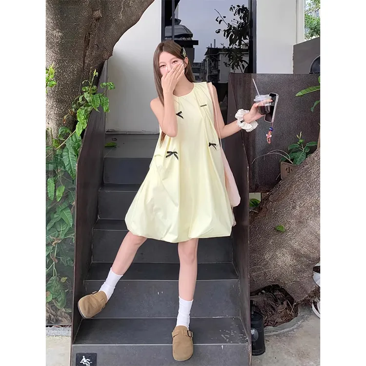 甜美风蝴蝶结黄色无袖背心连衣裙女夏季小众减龄宽松显瘦花苞短裙