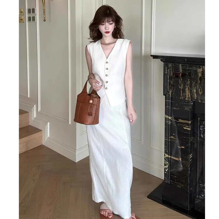 白色棉麻套装女夏季新款法式高级感气质通勤亚麻马甲半身裙两件套