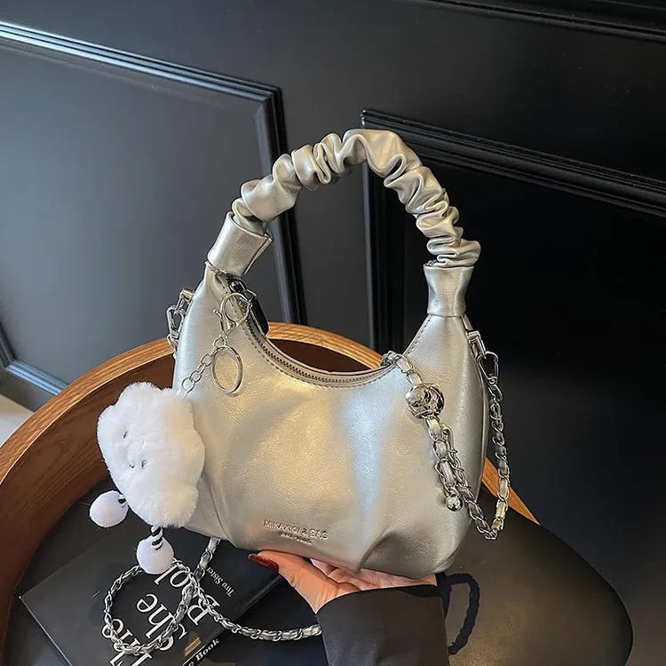 韩版小众包包女春夏2025新款时尚链条斜挎包高级感手提褶皱饺子包
