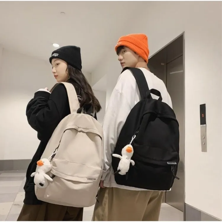 休闲日系轻便双肩包百搭初中大学生新款韩版男士时尚潮流双肩背