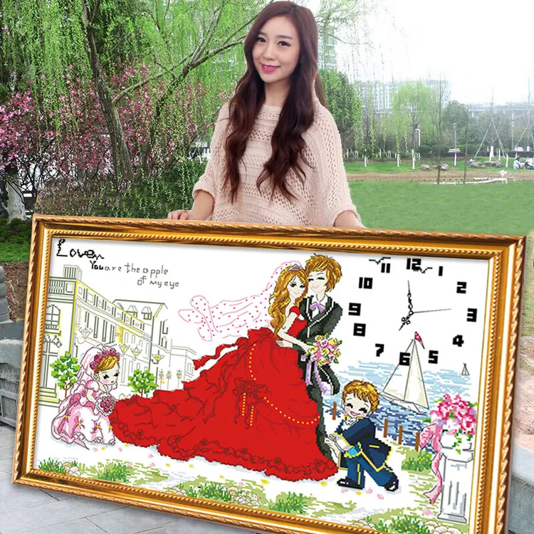 钟表结婚送新人礼物2025新款自己手工十字绣线绣婚礼系列客厅挂钟