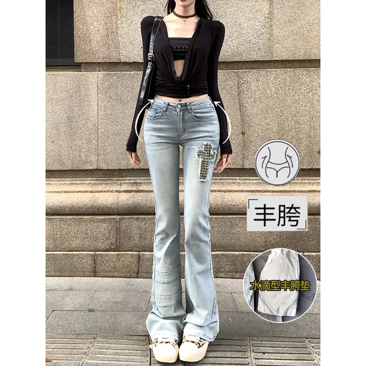 辣妹铆钉十字架丰胯牛仔裤2025秋季新款低腰修身显瘦提臀微喇长裤