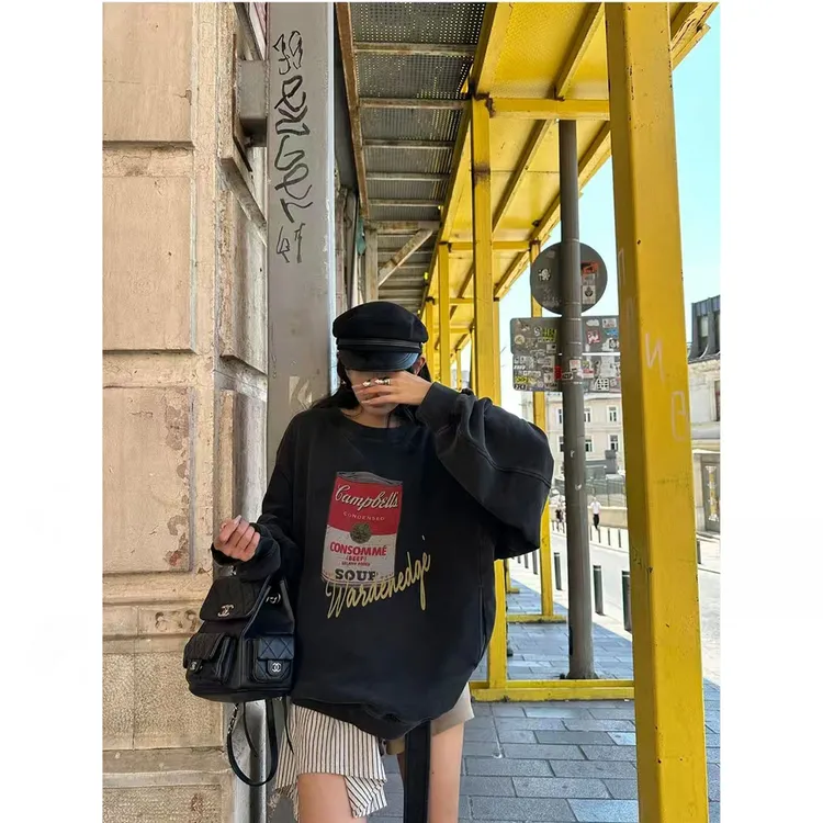 早秋季韩系衣服黑色罐头印花卫衣女款秋宽松长袖圆领套头长袖上衣