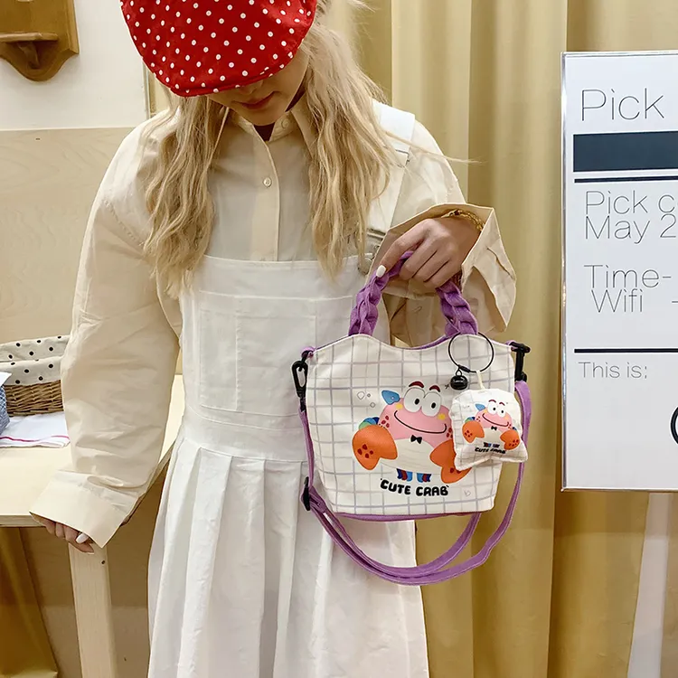 夏季新款卡通可爱少女心学生手提包水桶包可单件手提斜跨布包2503