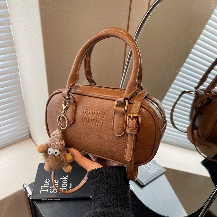 女生斜挎包保龄球女包小众设计新款复古手提小包包女保龄球包包