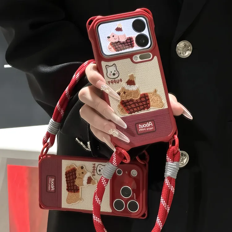新年红刺绣小狗挂绳适用苹果16/17promax手机壳华为vivoppo小米15
