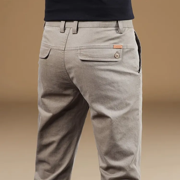 香港秋冬卡其色休闲裤男士2025新款修身弹力直筒高端商务百搭长裤