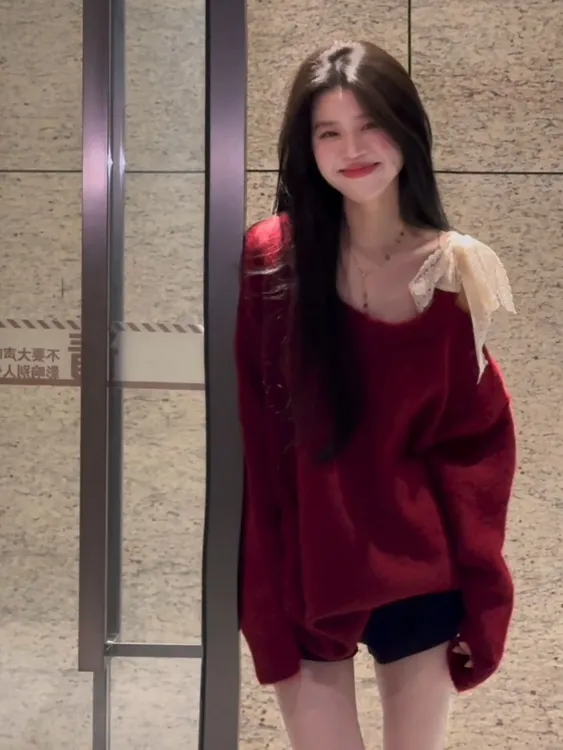红色慵懒圣诞氛围感长袖针织毛衣女秋冬松弛感软糯蝴蝶结系带上衣