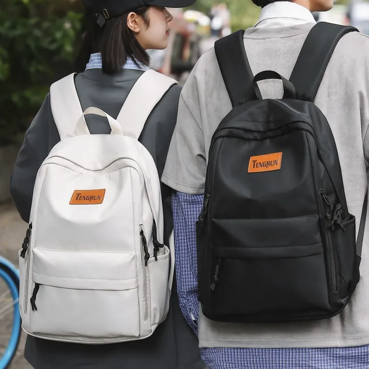 书包初中女生休闲简约大容量双肩包男生高中生大学生潮流旅行背包