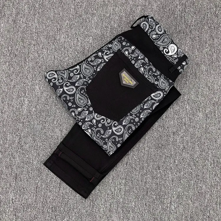 埃卢涅芬高端印花黑色牛仔裤男新款夏天超火薄款个性花纹修身小脚