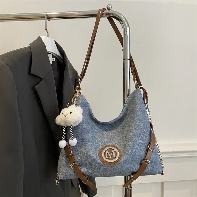 休闲通勤大容量包包女2025新款撞色双肩后背包单肩斜挎托特托特包