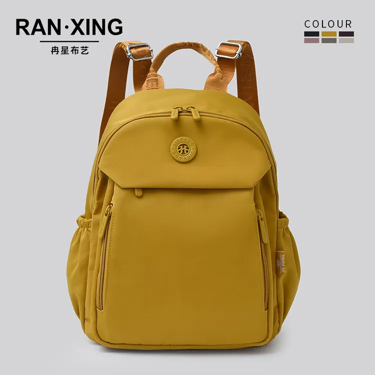 大容量轻便防水旅行双肩背包女2025爆款文艺风通勤妈咪包简约书包