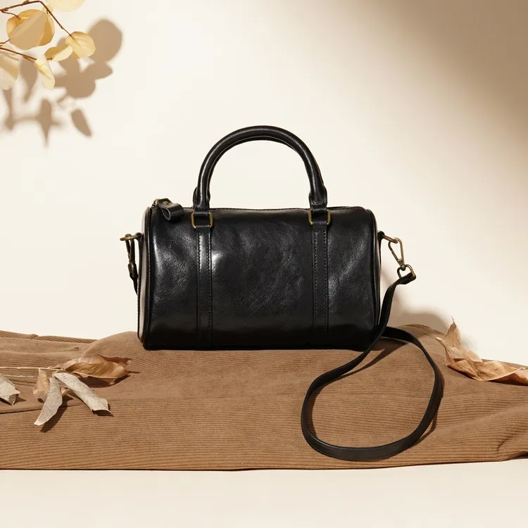 通勤风手提款单肩款休闲风女士斜挎包圆筒复古1028