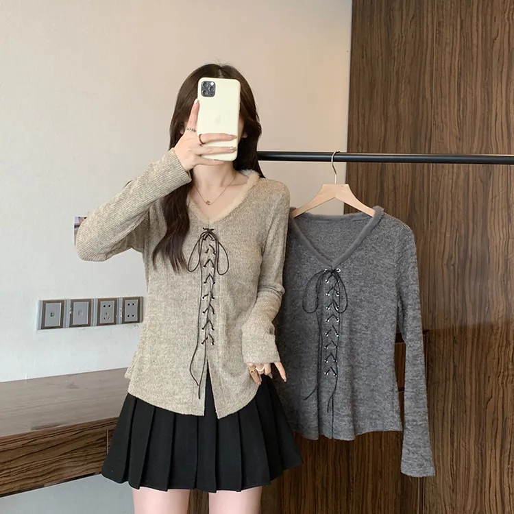 2025秋冬新款胖mm大码女甜美别致绑带设计感长袖针织上衣A2619