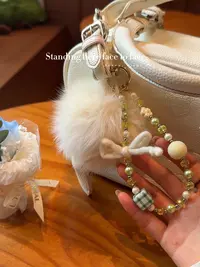 白色毛球潮玩手机挂件DIY饰品挂饰创意个性可爱手机链