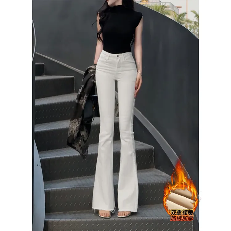 白色辣妹毛边加绒高腰弹力牛仔裤女2025年秋季新款显瘦喇叭长裤