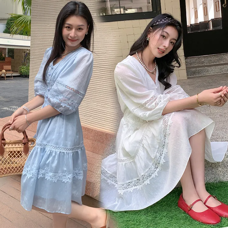 高端法式连衣裙仙女复古夏季新款镂空白色裙子沙滩度假中长A字裙