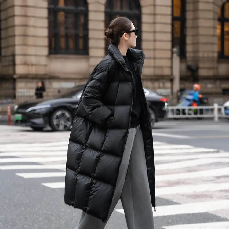 黑色廓形设计感加厚长款保暖鹅绒羽绒服女防钻风冬季2025新款