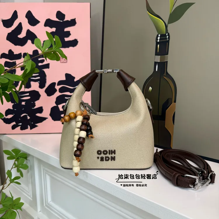 -蛋白软皮便当包可拆卸千金气质手提包公主度假风百搭设计师肩包