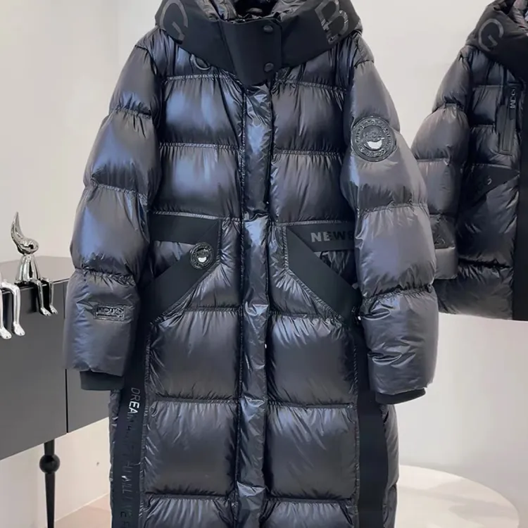 黑武士男女同款中长羽绒服2025年新款时尚亮面黑色设计感加厚冬季