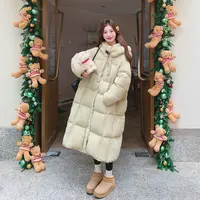 奶黄色泡芙羽绒服女款爆款2025新款韩系加厚保暖中长款白鸭绒外套