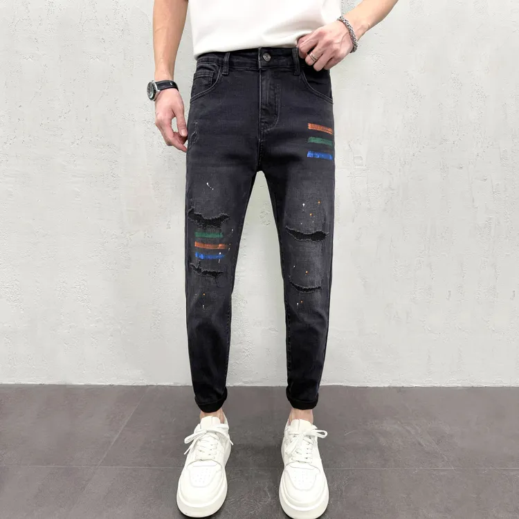 秋冬款男款小脚九分牛仔裤子痞帅潮牌复古泼墨破洞男士修身牛仔裤