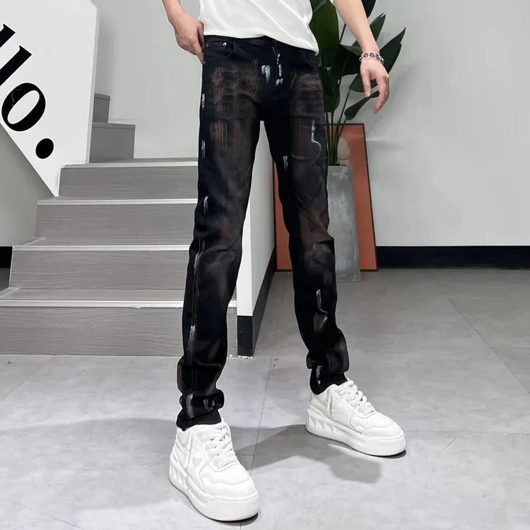 秋季新款小众潮流美式休闲风个性泼墨痞帅男士显瘦修身小脚牛仔裤
