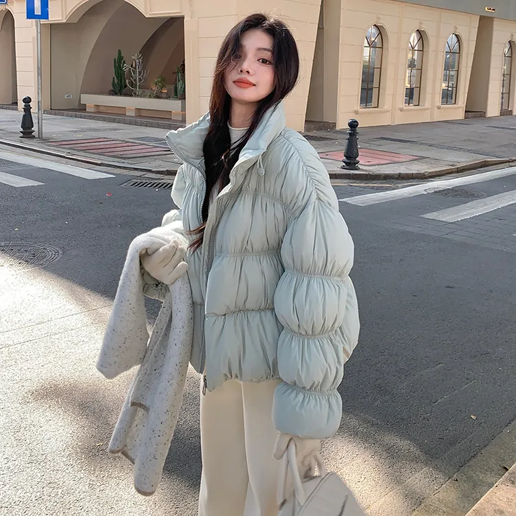 重工抽褶羽绒服女款2025新款冬季设计感黄色爆款短款立领保暖外套