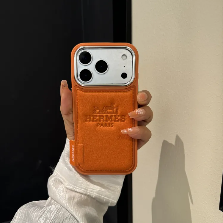 橙色适用苹果17promax手机壳金属镜头16皮纹15pro高级感14潮牌13