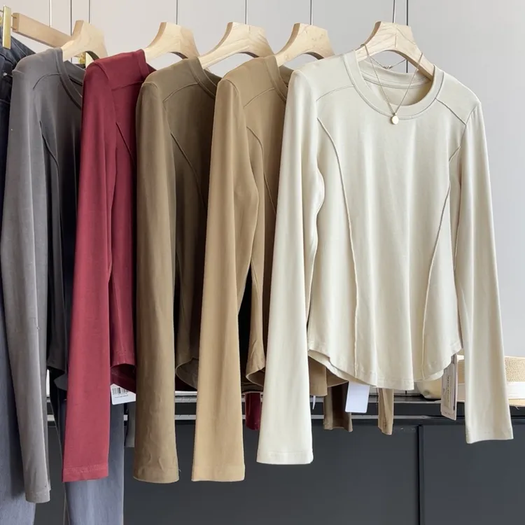 圆领弧形下摆长袖T恤女简约百搭纯色显瘦修身打底衫上衣