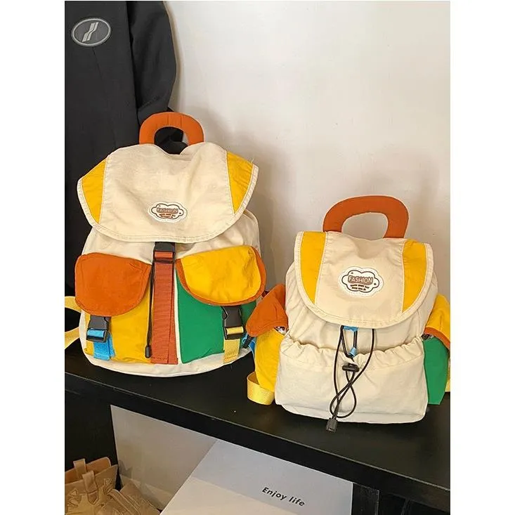 韩版多巴胺撞色女士双肩包网红洋气抽绳出游轻便学生书包新款背包