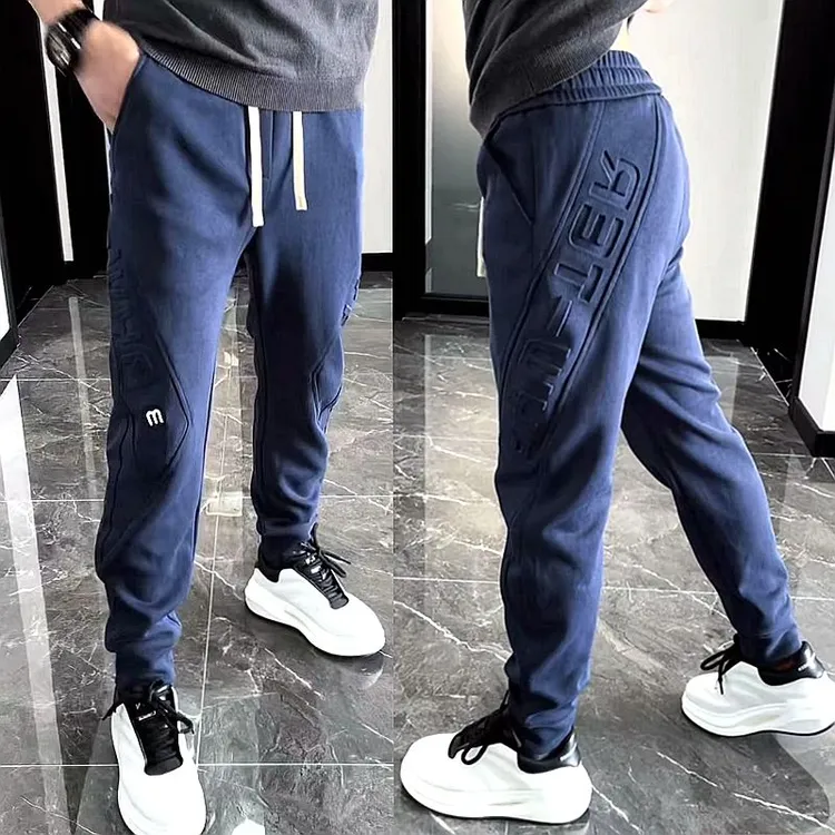 秋冬新款男士休闲裤立体钢印压花束脚卫裤简约时尚百搭哈伦运动裤