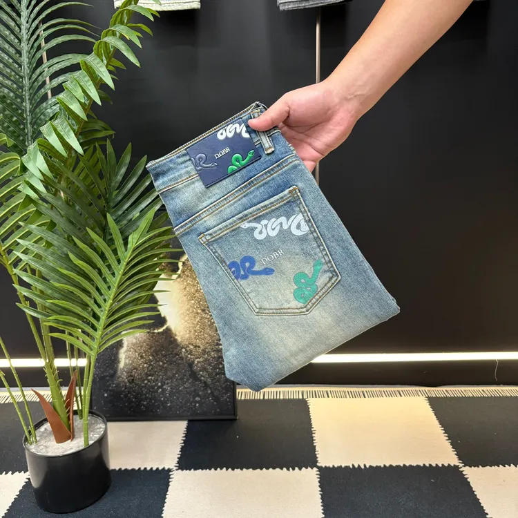 夏季新款薄款孔雀蓝修身男士牛仔裤直筒蓝色潮流弹力百搭轻奢高端