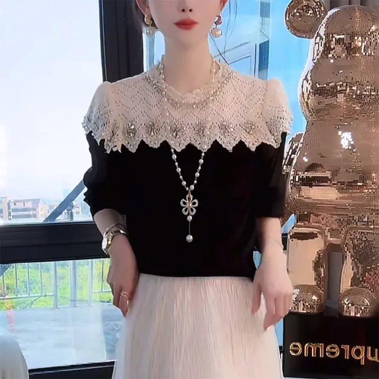 早秋女镂空针织衫高级感重工烫钻时尚减龄洋气内搭拼接打底上衣
