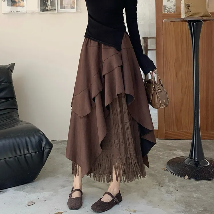 复古麂皮绒不规则半身裙女2025秋季新款设计高腰百搭a字流苏长裙