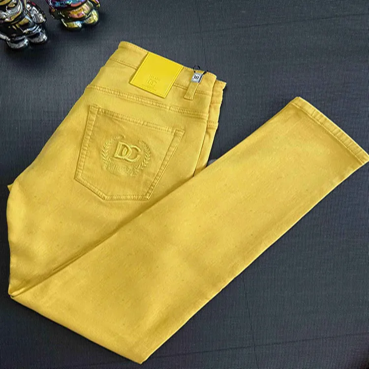 高街潮牌炫彩黄色牛仔裤男式秋冬季高档帅气长款休闲小脚牛仔裤子