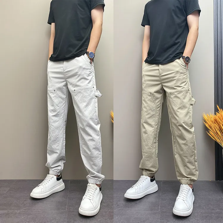 纯色铆钉拼接设计工装休闲裤男2025秋季款韩版百搭宽松束脚哈伦裤